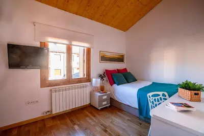 Cama o camas de una habitación en Casa Nieves