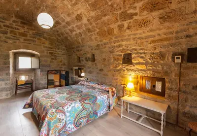 Cama o camas de una habitación en Casa Mur de Alujan