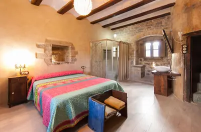 Cama o camas de una habitación en Casa Mur de Alujan
