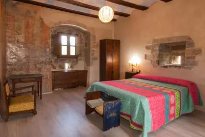 Cama o camas de una habitación en Casa Mur de Alujan