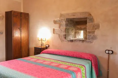 Cama o camas de una habitación en Casa Mur de Alujan