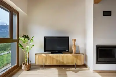 Una televisión o centro de entretenimiento en Casa estrellita NOA de CuentoGuía