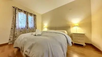 Cama o camas de una habitación en Villa R´Arco - tucasaenlospirineos