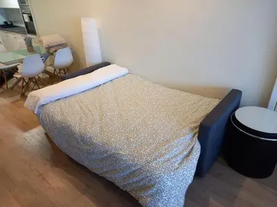 Cama o camas de una habitación en El Ritual Apartamento
