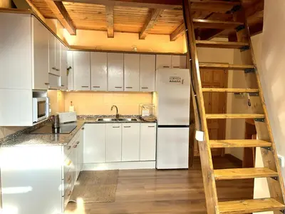 Una cocina o zona de cocina en Àtic lluminós al centre d’Esterri d'Àneu by RURAL D'ÀNEU
