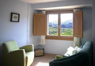 Zona de estar de Ca l'Aleixa Rooms