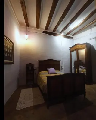 Cama o camas de una habitación en Ca l'Aleixa Rooms