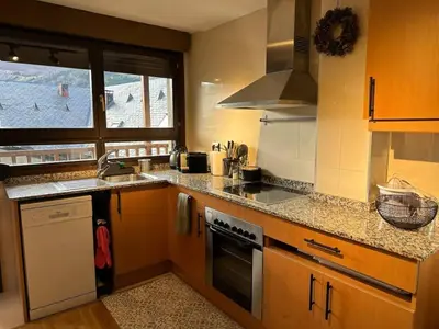 Una cocina o zona de cocina en Caleydos - Dúplex diseño by CARDI Suites