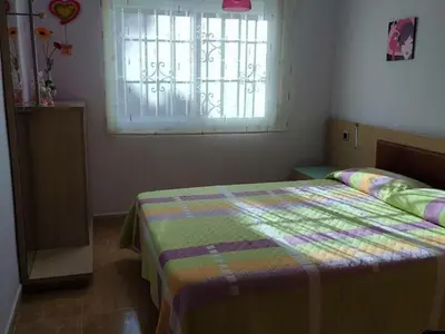 Cama o camas de una habitación en Casa céntrica en Miami Playa con piscina privada y barbacoa - ES-9-156