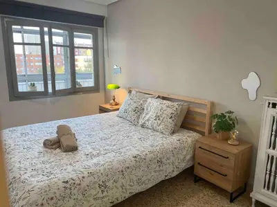 Cama o camas de una habitación en Acogedor apartamento a 5 min del Ave