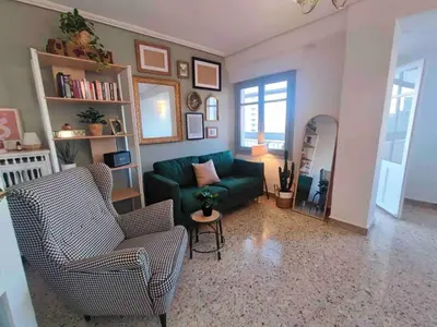 Zona de estar de Acogedor apartamento a 5 min del Ave