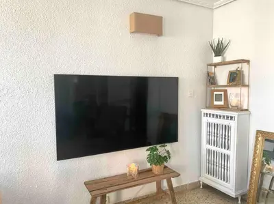 Una televisión o centro de entretenimiento en Acogedor apartamento a 5 min del Ave