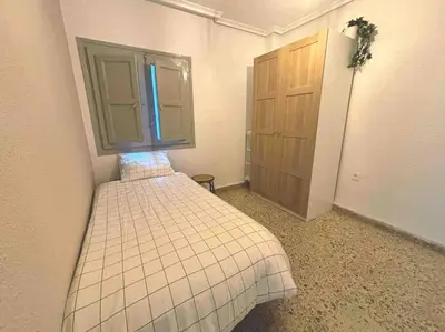 Cama o camas de una habitación en Acogedor apartamento a 5 min del Ave