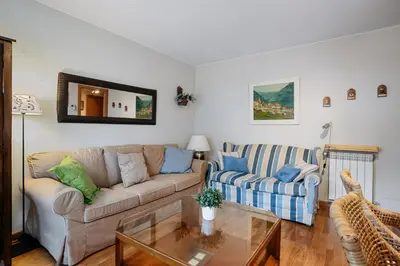 Zona de estar de Gaudioso by Cardi Suites