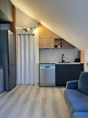 Una cocina o zona de cocina en Acogedor Ático en el Corazón de Formigal - Esquía sin llaves