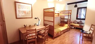 Cama o camas de una habitación en Molino21 Castiello de Jaca