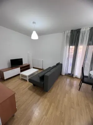 Zona de estar de Apartamento en Sabiñánigo para grupos con amplia y soleada terraza