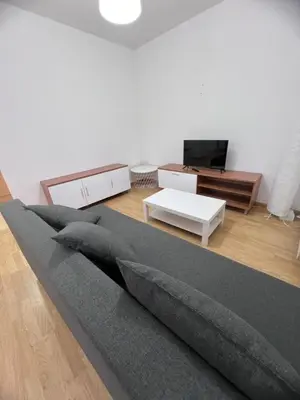 Una televisión o centro de entretenimiento en Apartamento en Sabiñánigo para grupos con amplia y soleada terraza