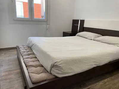 Cama o camas de una habitación en Apartament dels Mestres