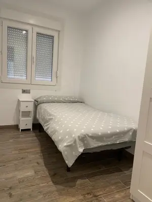 Cama o camas de una habitación en Apartament dels Mestres