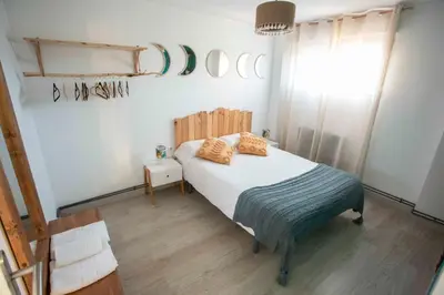 Cama o camas de una habitación en El Mirador del Pilar - Parking y vistas a la basílica
