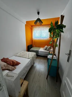 Cama o camas de una habitación en El Mirador del Pilar - Parking y vistas a la basílica