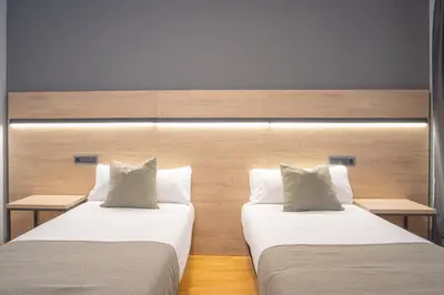 Cama o camas de una habitación en VTZ Hotel El Príncipe