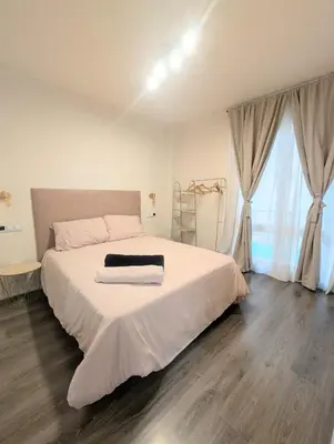 Cama o camas de una habitación en Apartamentos Crispin Anais