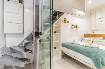 Cama o camas de una habitación en Luxury Duplex Plaza del Pilar