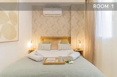 Cama o camas de una habitación en Luxury Duplex Plaza del Pilar