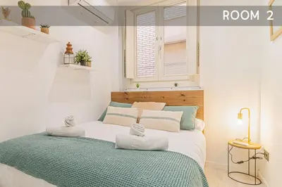 Cama o camas de una habitación en Luxury Duplex Plaza del Pilar