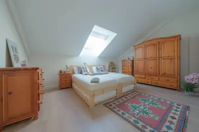 Cama o camas de una habitación en El Ventanal de Collarada