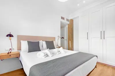 Cama o camas de una habitación en Hogar Lujoso Centro Zaragoza