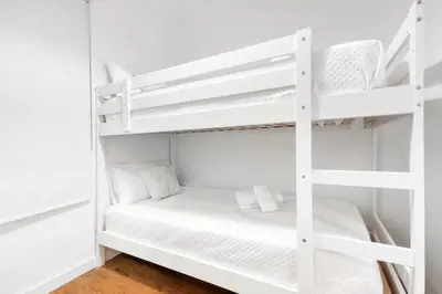 Cama o camas de una habitación en Hogar Lujoso Centro Zaragoza