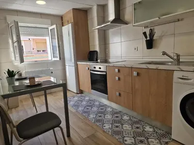 Una cocina o zona de cocina en PASARELA ALMOZARA HOME & Parking gratis