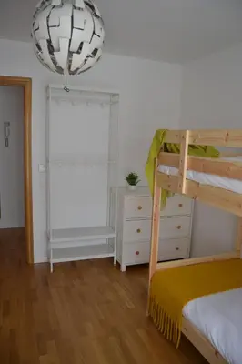 Cama o camas de una habitación en Ventanal de Saras Petfriendly Garaje Trastero y Chimenea - Arafita Apartamentos