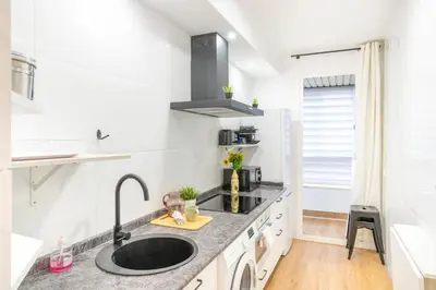 Una cocina o zona de cocina en Espacioso y cómodo apartamento en Pamplona