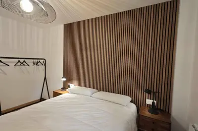 Cama o camas de una habitación en Mimosa 4 con terraza - tucasaenlospirineos