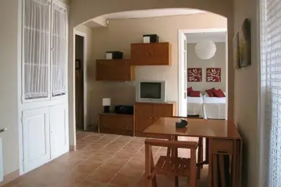 Una televisión o centro de entretenimiento en Ca la tieta Quima