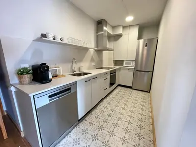Una cocina o zona de cocina en Apartamento en el centro de Benasque con piscina
