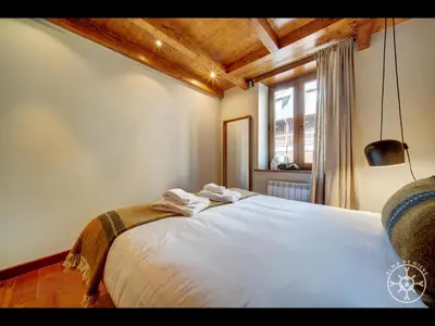 Cama o camas de una habitación en ETH CAUDER de Alma de Nieve