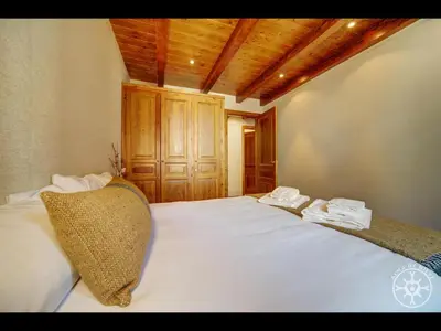 Cama o camas de una habitación en ETH CAUDER de Alma de Nieve