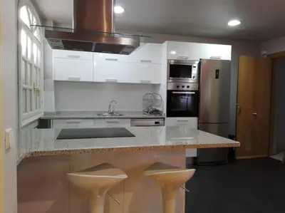 Una cocina o zona de cocina en Atico en el centro UAT00614