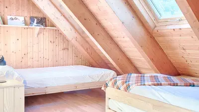 Cama o camas de una habitación en Saplan Real Estate DUPLEX LONGUERA