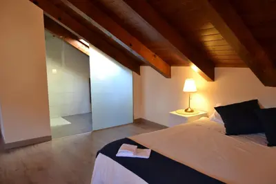 Cama o camas de una habitación en NRY ESTANCES I SERVEIS EL TARTER 2