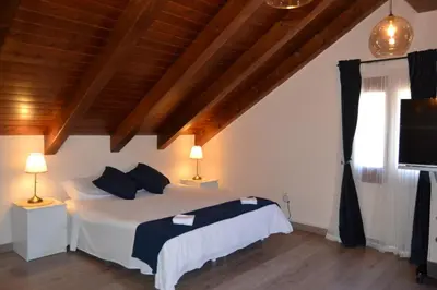 Cama o camas de una habitación en NRY ESTANCES I SERVEIS EL TARTER 2