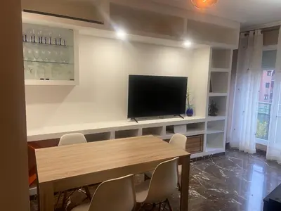 Una televisión o centro de entretenimiento en Casa Carlos