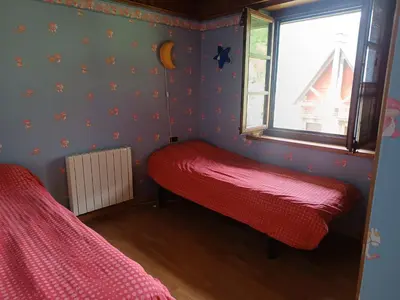 Cama o camas de una habitación en Duplex Cerler