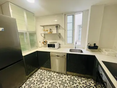 Una cocina o zona de cocina en Fabuloso en el corazón de la ciudad y con garaje