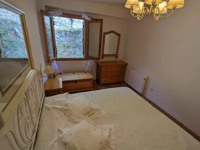 Cama o camas de una habitación en Mi rincón con vistas Panticosa